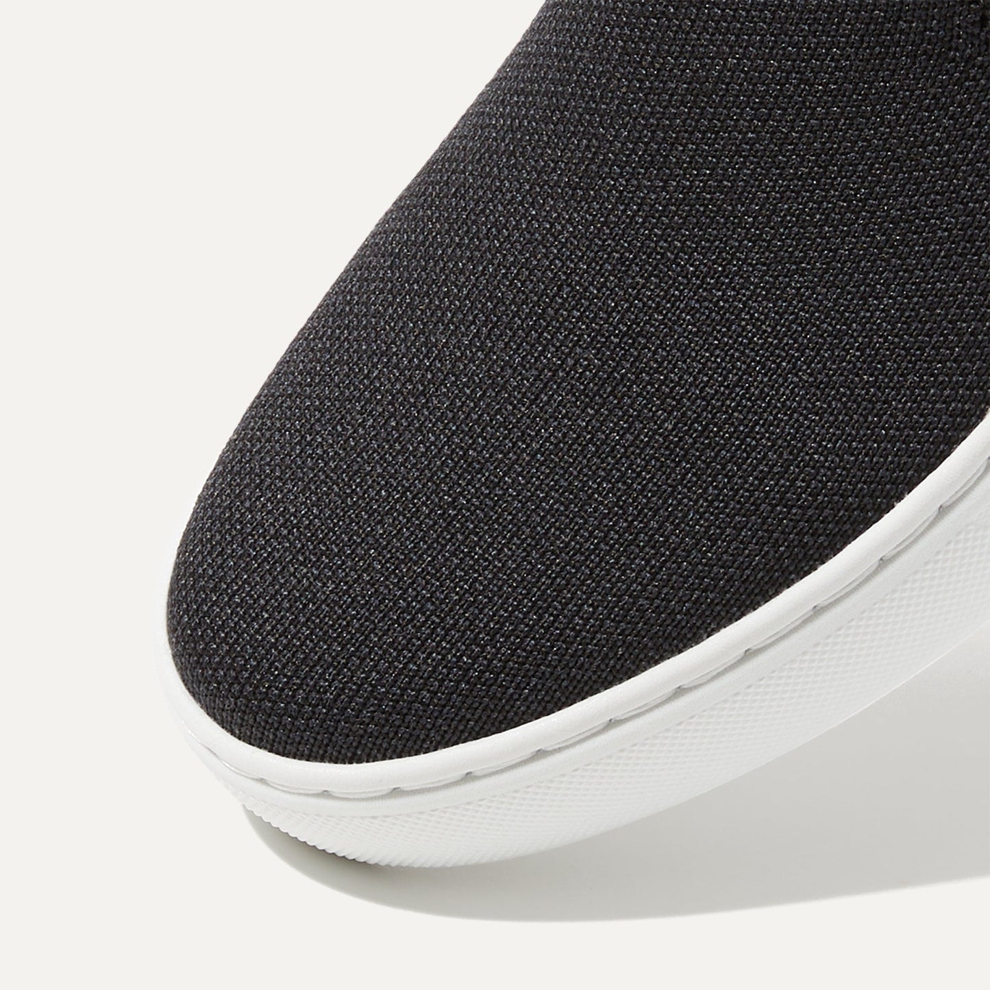 Rothys The Original Slip On Sneaker in Black Solid